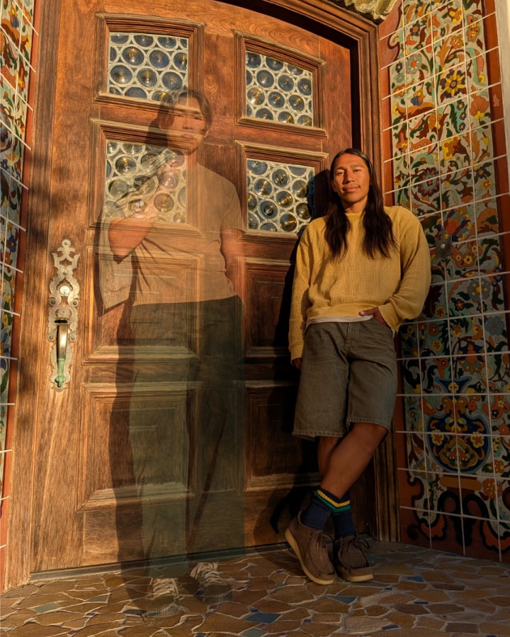 Add Me works to create a photo of two people in a sunlit room.