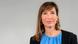 DW Director-General Barbara Massing standing in front of a grey background