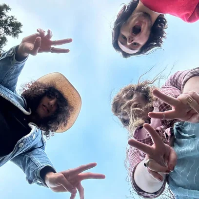 three friends taking a photo from above